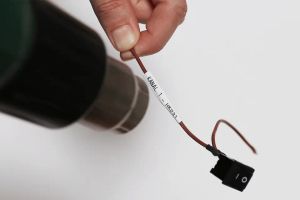 Термо-шлаух лента Brother HSE-231E, 11.2mm, Black on White Heat Shrink Tube